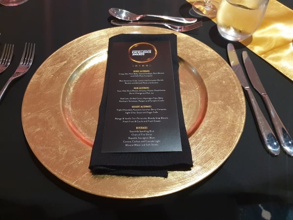 Gold Acrylic Charger Plate with Black Napkin
