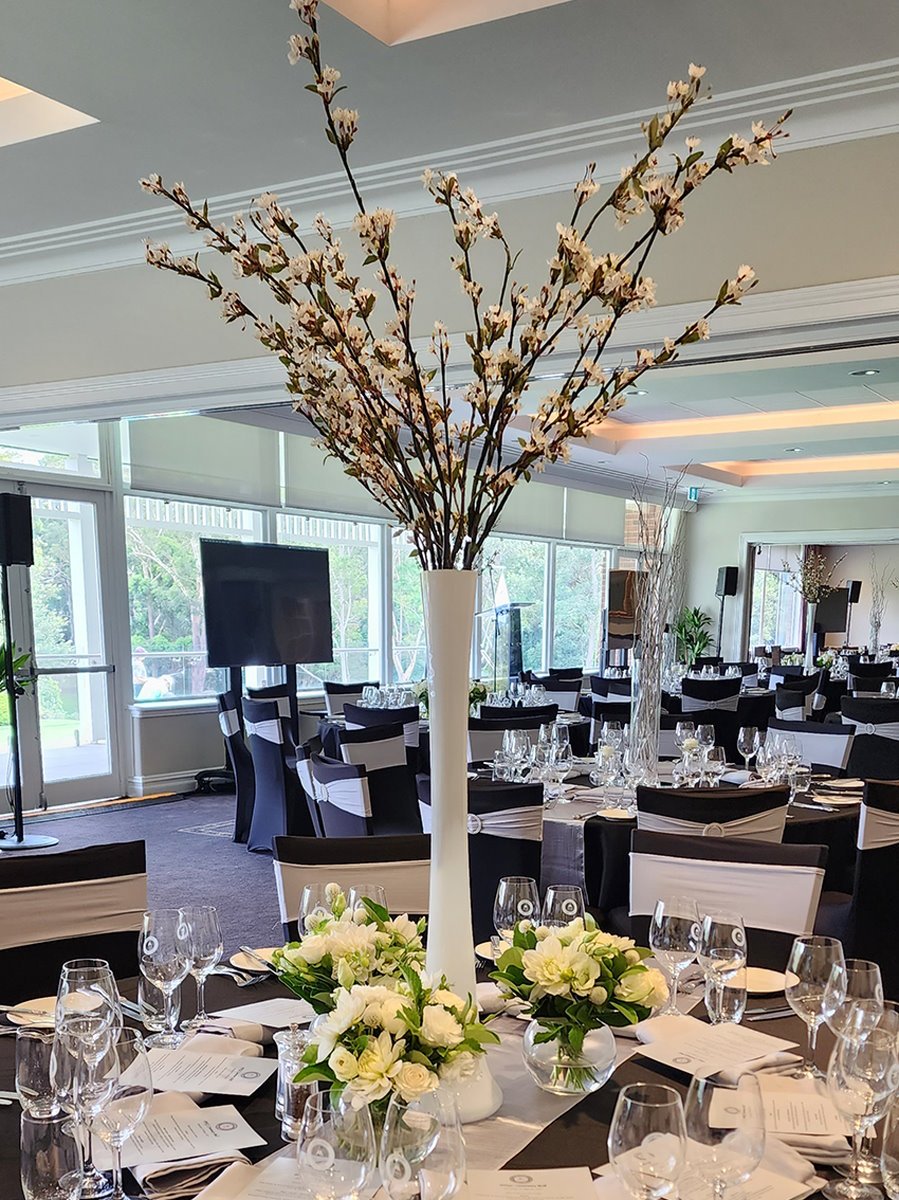 Cherry Blossoms in Tall White Vase Centrepiece
