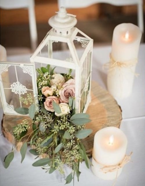 Lantern with Seasonal Flowers on Timber Slice Centerpiece