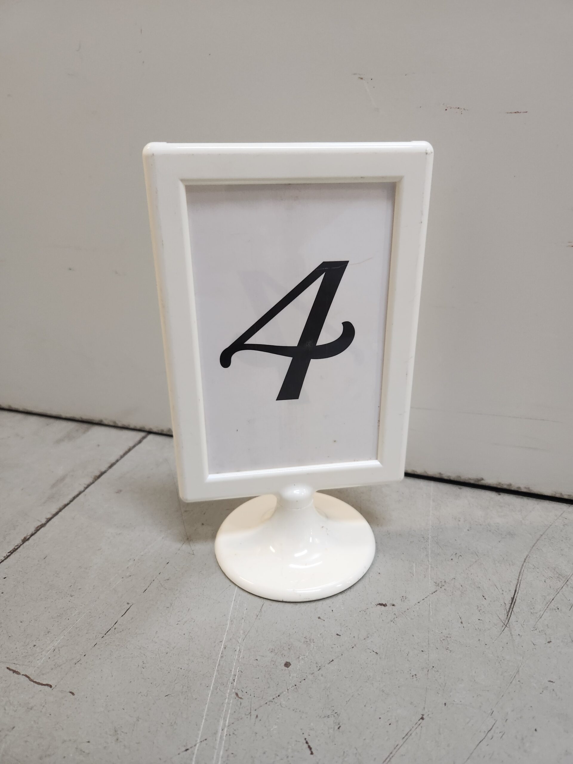 white framed table numbers